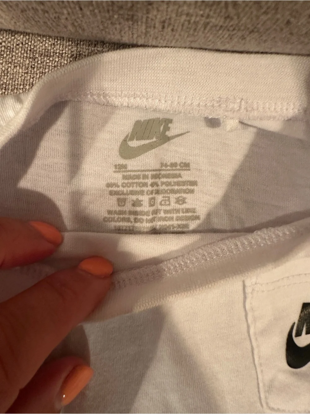 Nike White T-Shirt with Black Swoosh and Subtle Grey Tag Print - Picture 2 of 2